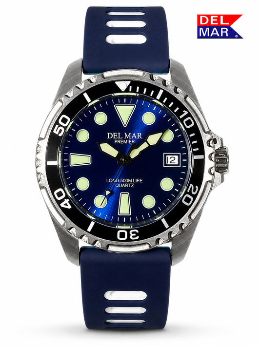 Walk from the day job to your favorite watering hole and worry not. This Del Mar Pro Dive 500 M Watch will keep your watch safe - a sapphire blue dial with luminous readers and hands, plus a black and white silicone strap.
