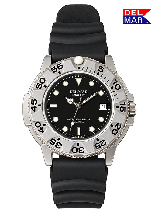 A Del Mar Long Life wristwatch with a black dial, black rubber strap, and a silver stainless steel case with a rotating black bezel, shown on a white background with a Del Mar logo in the top right corner.